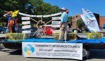 The Community Resource Council's eight programs highlighted on a Windjammer Days parade float. Courtesy of the Community Resource Council