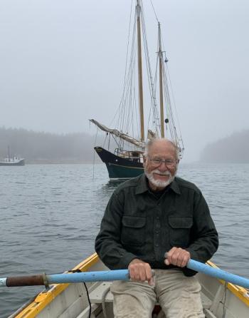Fred Bowers rowing to his boat. Courtesy of Fred Bowers