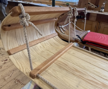 Finished Carpenter's Boat Shop toboggans, primed for their next-day downhill competition. Courtesy photo
