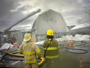 Firefighters at the scene of the Boothbay Harbor fire. Mark Sullivan photo Mark Sullivan photo