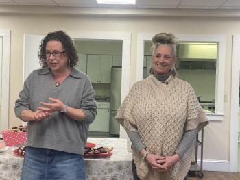 Hannah Corkum, left, and Michele Melanson speak at the Boothbay Harbor Congregational Church lunch on Feb. 5. Vicki Haugen photo