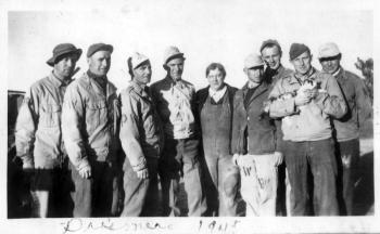 In 1945, these German POWs posed with the owner of a farm near Houlton where they worked. Note the prisoner holding one of the farm cats. Courtesy of Old Bristol Historical Society In 1945, these German POWs posed with the owner of a farm near Houlton where they worked. Note the prisoner holding one of the farm cats. Courtesy of Old Bristol Historical Society