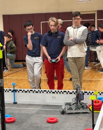 Brandon Seigars, Lucian Stoddard, and Anthony Angelico think about their strategy before one of their qualifying matches on Saturday in Monmouth. Courtesy of Kristen Hanley Brandon Seigars, Lucian Stoddard, and Anthony Angelico think about their strategy before one of their qualifying matches on Saturday in Monmouth. Courtesy of Kristen Hanley