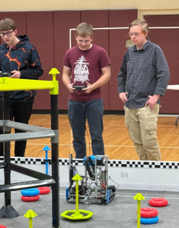 Chase Mansfield and Afton Warren-Burdin await the start of a match at the Vex qualifying competition in Monmouth on Saturday. Courtesy of Kristen Hanley Chase Mansfield and Afton Warren-Burdin await the start of a match at the Vex qualifying competition in Monmouth on Saturday. Courtesy of Kristen Hanley
