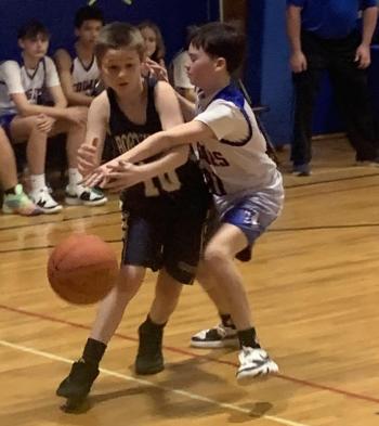 Boothbay guard Isiah Bates scored two points in his team's loss to Great Salt Bay Feb.5 in the Busline League Small Conference Basketball Championship game. BILL PEARSON/Boothbay Register bres