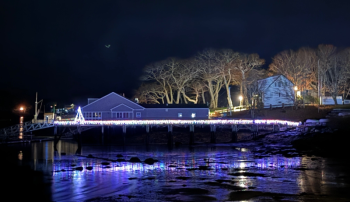 The Boothbay Harbor Yacht Club illuminated for the season. Courtesy photo