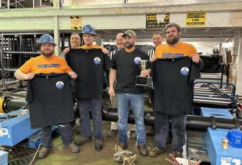 The "Mud Dogs," consisting of Gage Seavey, Cody Brown, Weston Alley and Shawn Simmons, take home the trophy at annual pipe tapping competition. Courtesy of the Boothbay Region Water District