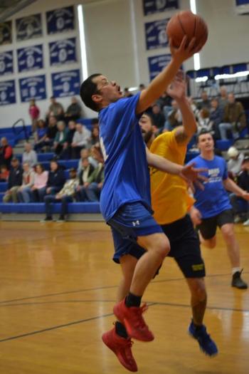 Bruce Orne tries to stop Julian Aponte's shot. KEVIN BURNHAM/Boothbay Register