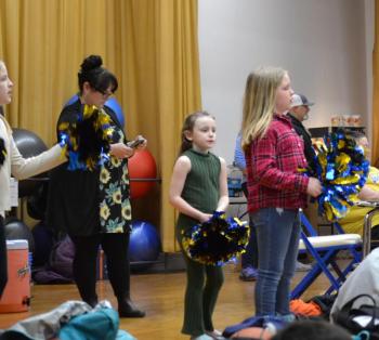Cheerleaders on the stage. KEVIN BURNHAM/Boothbay Register
