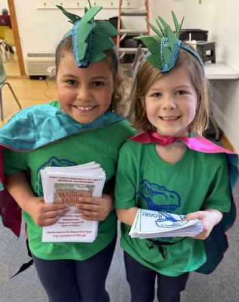 Penny Navarrete and Addie Adams hand out programs. Courtesy of Emily Mirabile