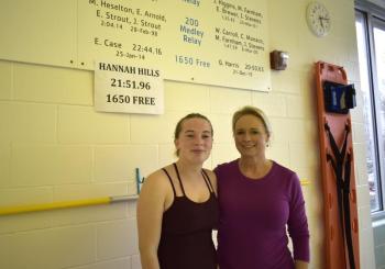 Hills and Aimee Case, mother of the previous record holder Evy Case, pose in front of Hill's score. ISABELLE CURTIS/Boothbay Register