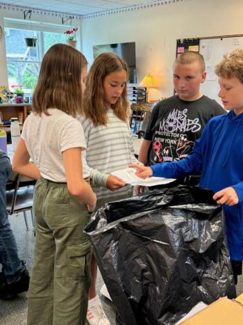 EES students refer to the map of the school before heading out to collect paper for recycling. Lilianna, daughter of Trista and Brian Cassidy; Maxine, daughter of Pascale and Kirk Zehm; Kayleb, son of Vanessa Bailey; and Sam, son of Daniel and Maureen Cooper. Students are residents of Alna and Edgecomb. Courtesy photo EES students refer to the map of the school before heading out to collect paper for recycling. Lilianna, daughter of Trista and Brian Cassidy; Maxine, daughter of Pascale and Kirk Zehm; Kayleb, son of Vanessa Bailey; and Sam, son of Daniel and Maureen Cooper. Students are residents of Alna and Edgecomb. Courtesy photo