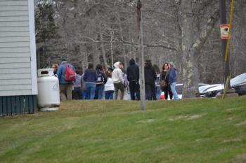 Students start walking to the elementary school following the evacuation of the high school. KEVIN BURNHAM/Boothbay Register
