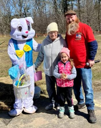 Titan Lewis as the Easter Bunny, Darlene Little, Madison Little (2024 Golden Egg winner in the five and under category), and event emcee, Darrell Gudroe. Courtesy of Eve Jamieson