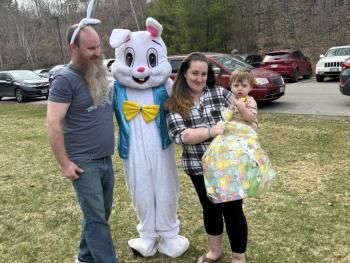 Younger kids Golden Egg finder Hudson Martin with mom Hannah Prest, emcee Darrell Gudroe and the Easter Bunny. LISA KRISTOFF/Boothbay Register LISA KRISTOFF/Boothbay Register