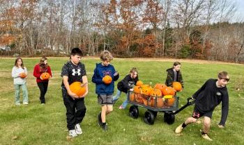 Last fall EES sixth graders were eager to deliver Math-o-lanterns to the compost area next to the school gardens. Who doesn’t love smashing pumpkins?! Left to right: Maxine, daughter of Pascale and Kirk Zehm; Jacob, son of Ellen and Neal Verge; Sam, son of Daniel and Maureen Cooper; Azalea, daughter of Laurel and Max Averill; Andrew, son of Amanda and Andy Main; and Mason, son of Nicole McKay and Patrick Wenners. Students are residents of Alna and Edgecomb. Courtesy photo Last fall EES sixth graders were eager to deliver Math-o-lanterns to the compost area next to the school gardens. Who doesn’t love smashing pumpkins?! Left to right: Maxine, daughter of Pascale and Kirk Zehm; Jacob, son of Ellen and Neal Verge; Sam, son of Daniel and Maureen Cooper; Azalea, daughter of Laurel and Max Averill; Andrew, son of Amanda and Andy Main; and Mason, son of Nicole McKay and Patrick Wenners. Students are residents of Alna and Edgecomb. Courtesy photo
