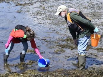 Delia Downes, left, and Dell Downes exploring tidepools. FRITZ FREUDENBERGER/Boothbay Register