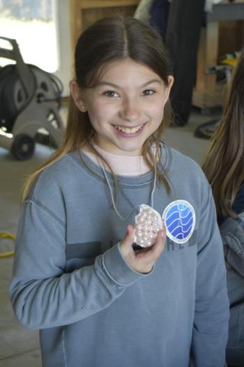 Sheyenne Upham with a decorated oyster shell. FRITZ FREUDENBERGER/Boothbay Register