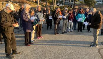 Boothbay Baptist Church pastor Glen Carter led the Sunrise Easter service with a crowd of over two dozen participants. BILL PEARSON/Boothbay Register Bayville crowd