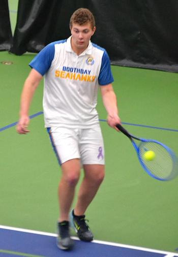 Seahawk senior Neal Baldwin gets to the ball during his doubles match against Winthrop on May 7. He and partner Avery Fowlie won 10-0. KEVIN BURNHAM/Boothbay Register