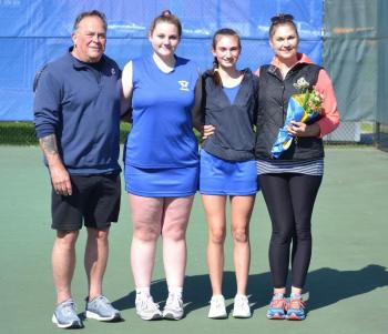 Seahawk senior girls tennis players Ivory Cody and Laura Chapman stand with their parents after being honored before the team's final home match on May 14. Pictured from left are David Cody, Ivory Cody, Laura Chapman and Kristie Chapman. KEVIN BURNHAM/Boothbay Register
