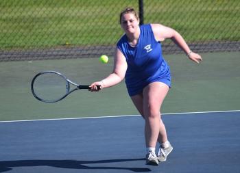 Ivory Cody, second doubles player with Maddie Andreasen, looks to return a shot against Spruce Mountain on May 14. KEVIN BURNHAM/Boothbay Register