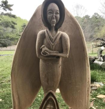 Hand-carved wooden sculpture by Keith Plummer