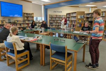 Rising BRHS sophomore Jackson Zehm presents the CSD School Committee with a proposal for a town cleanup day to prevent pollution from accumulating in snowbanks. FRITZ FREUDENBERGER/Boothbay Register