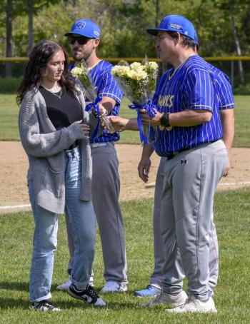 Bailey Lewis receives her flower. FRITZ FREUDENBERGER/Boothbay Register