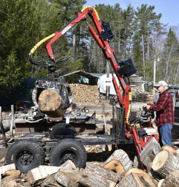 William 'Billy Smith processes wood. FRITZ FREUDENBERGER/Boothbay Register