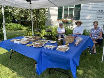 Freda Burnham, Sarah Giles, and Trish Fallon welcome hungry visitors to the Boothbay Region Historical Society bake sale. FRITZ FREUDENBERGER/Boothbay Register