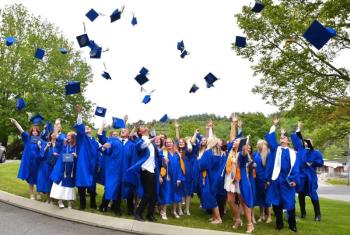 Cap-tossing following the 2025 BRHS graduation ceremony. File photo