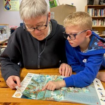 Midcoast Literacy tutor Kathleen works one-on-one with her 2nd grade learner. Katie Clark photo