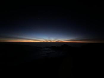 The sun rises on Mount Kilimanjaro. Courtesy of Greg Godkin.