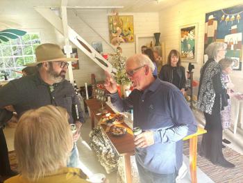 Dick Alden, right, Matt Barter, left, and Priscilla Alden talking art, of course. LISA KRISTOFF/Boothbay Register LISA KRISTOFF/Boothbay Register
