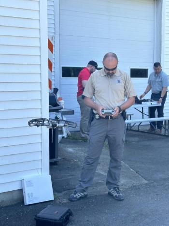 Three members of LCSO drone team. Detective Sgt. Ronnie Rollins in (front), Detective Matt Ryan (left) and Detective Jared Mitkus (right.)   Courtesy LCSO