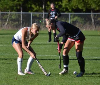 Arabella Hodgdon and a Hall-Dale player work to get possession of the ball. KEVIN BURNHAM/Boothbay Register