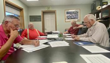 BSHD trustees overlook the incident report for higher than permitted bacteria levels. ISABELLE CURTIS/Boothbay Register