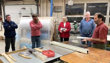 Boothbay Region High School STEAM Teacher Chip Schwehm, right, leads a tour of the shop classroom in 2024. FRITZ FREUDENBERGER/Boothbay Register