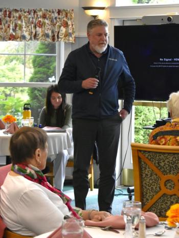 Jeff Slack of MaineHealth Care Partners offers thanks for auxiliary donations. ISABELLE CURTIS/Boothbay Register
