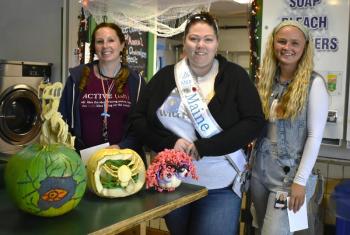 After much debate, judges Tracy Warlick, Katie Cunningham and Heather Legendre settle on the winners for this year's pumpkin decorating competition. ISABELLE CURTIS/Boothbay Register
