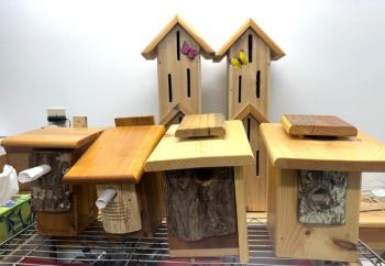 Bluebird, bird and butterfly houses constructed by Stan Wakefield. 