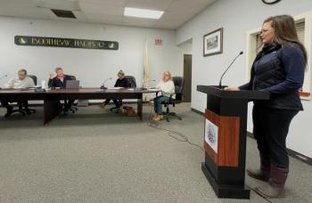 Shri Verrill, right, updates the Boothbay Harbor Selectboard on local climate resilience work Nov. 10. FRITZ FREUDENBERGER/Boothbay Register