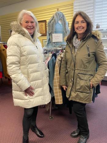 Volunteers Debbie Watson, left, in Ralph Lauren and Sarah Waterman in French Connection. Sarah’s jacket may still be on the rack but Debbie’s went home with her. Courtesy photo 