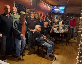 Local Marine Corps veterans gather at Brady's for the 250th birthday of the military branch. Jen Mitchell photo