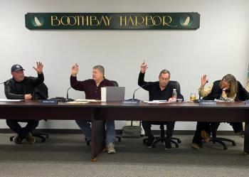 The Boothbay Harbor Selectboard takes a vote during their Dec. 22 meeting. From left, Mark Gimbel, Michael Tomko, Ken Rayle, and Alyssa Allen. FRITZ FREUDENBERGER/Boothbay Register