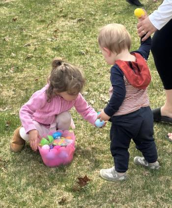 Sharing at the Easter Egg hunt. LISA KRISTOFF/Boothbay Register