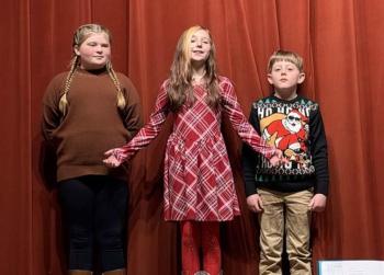 A trio of singers. Courtesy of Eileen Higgins/SCS