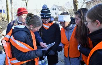 Students consult their trash pickup route map. FRITZ FREUDENBERGER/Boothbay Register 