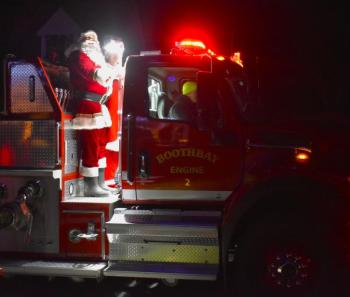 Santa and Mrs. Claus arrived in style on a Boothbay Fire Department Truck. FRITZ FREUDENBERGER/Boothbay Register